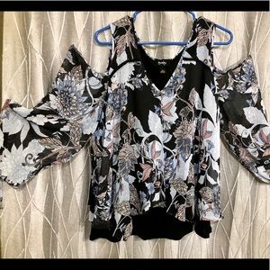 Black tank with floral flowing overlay